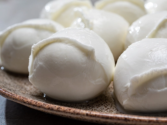balls of fresh mozzarella places on a plate